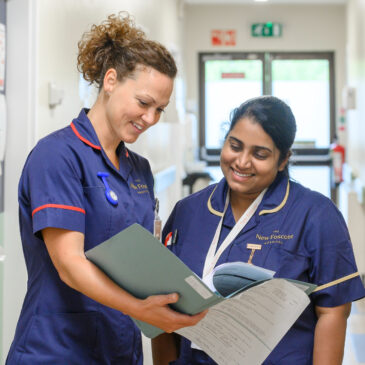 Nurses talking about a patient's file