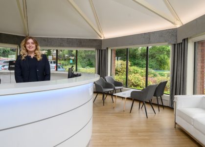 A Receptionist in the reception area at The New Foscote Hospital