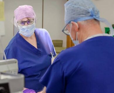 Surgeon and nurse in ENT theatre