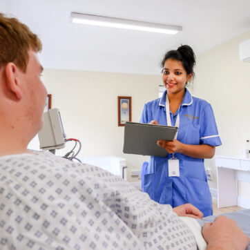 nurse talking to patient